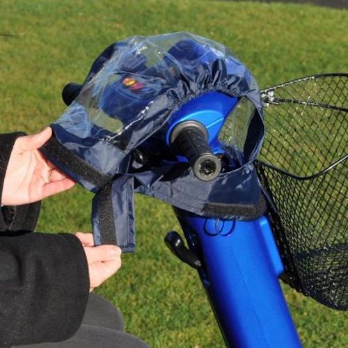 Mobility Scooter Control Panel Cover over blue scooter