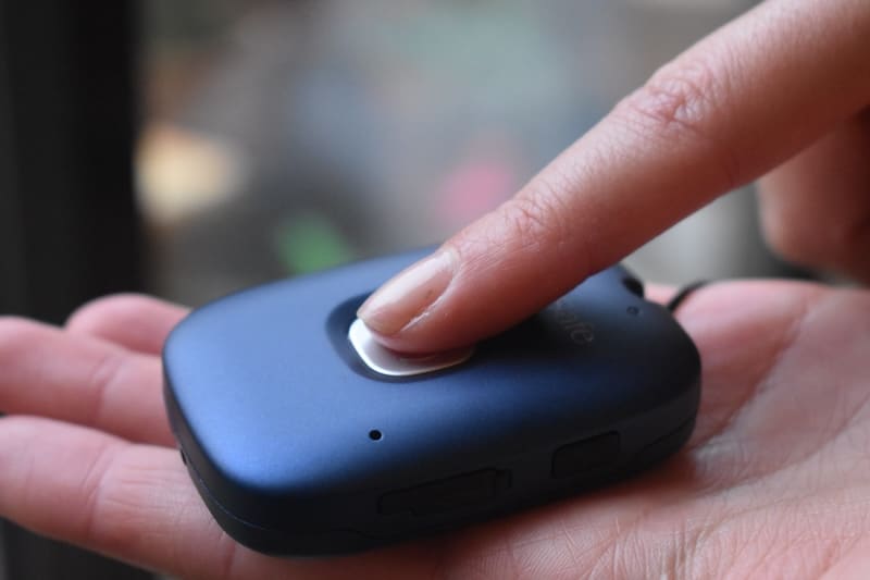 SureSafeGO Age Space Review Image - SOS being pressed