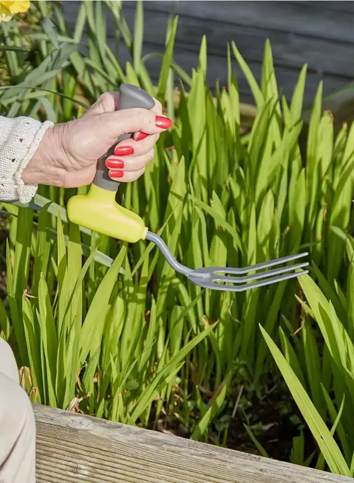 comfi grip garden fork used outside on grass